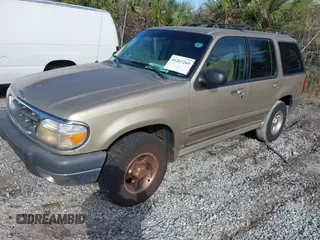 1999 Ford Explorer z VIN 1FMZU32X7XUB01672, wystawiony jako IAAI lot #41263264 z przebiegiem 148 134 mil mil oraz . Historia ofert i sprzedaży dostępna na DreamBid. Obrazek 2.