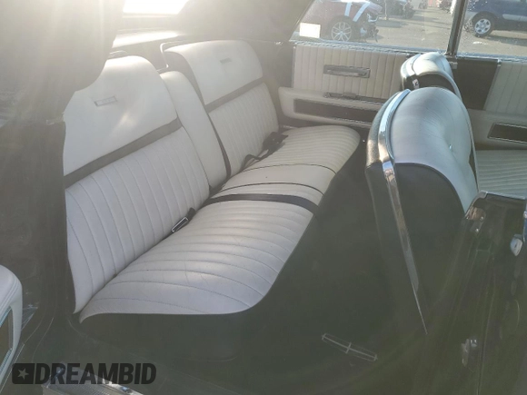 1965 Lincoln Continental with VIN 5Y86N428064, listed as a Copart auction lot 76812744 with 15,659 mi miles and Salvage Title. Bid and sale history available at DreamBid. Image 10.