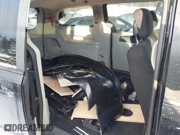 2012 Dodge Grand Caravan SE with VIN 2C4RDGBG7CR139874, listed as a IAAI auction lot 41377432 with 136,870 mi miles and . Bid and sale history available at DreamBid. Image 8.