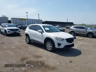 2013 Mazda CX-5 Touring with VIN JM3KE4CE1D0136241, listed as a IAAI auction lot 42119260 with 106,913 mi miles and . Bid and sale history available at carsss.com. Image 1.