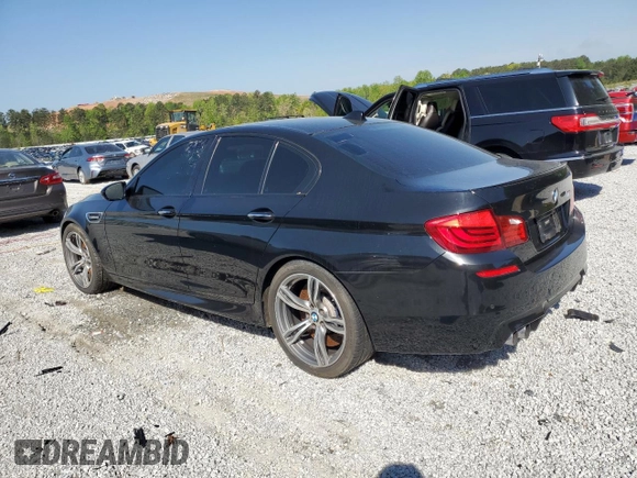 2013 BMW M5 z VIN WBSFV9C55DC772482, wystawiony jako Copart lot #52575345 z przebiegiem 173 513 mil mil oraz Czysty tytuł • Clean title. Historia ofert i sprzedaży dostępna na DreamBid. Obrazek 2.
