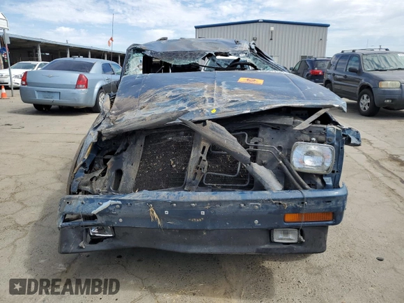 1994 GMC Jimmy SL z VIN 1GKCS13WXR0532905, wystawiony jako Copart lot #60670404 z przebiegiem 116 002 mil mil oraz Nie do naprawy. Historia ofert i sprzedaży dostępna na DreamBid. Obrazek 5.