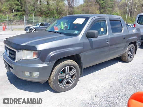 2009 Honda Ridgeline RTL with VIN 2HJYK16539H503533, listed as a IAAI auction lot 42040423 with 206,102 mi miles and . Bid and sale history available at DreamBid. Image 2.