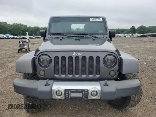 2014 Jeep Wrangler Unlimited Sahara with VIN 1C4HJWEG7EL299548, listed as a Copart auction lot 58522355 with 76,057 mi miles and Clean title. Bid and sale history available at DreamBid. Image 5.