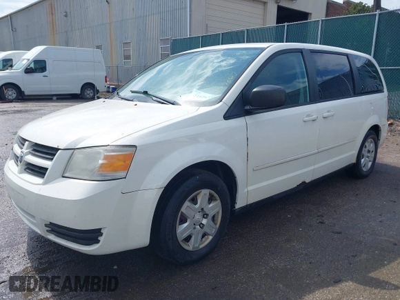 2010 Dodge Grand Caravan SE with VIN 2D4RN4DE1AR207867, listed as a IAAI auction lot 41826730 with 273,438 mi miles and . Bid and sale history available at DreamBid. Image 2.