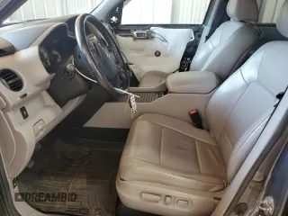 2012 Honda Pilot EX-L with VIN 5FNYF4H50CB058303, listed as a Copart auction lot 60607375 with 147,939 mi miles and Salvage title. Bid and sale history available at DreamBid. Image 7.