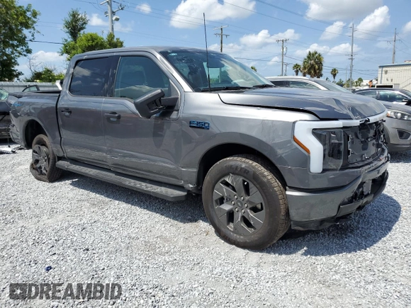2024 Ford F-150 Lightning XLT with VIN 1FTVW3LK8RWG23783, listed as a Copart auction lot 58359625 with 5,864 mi miles and Salvage title. Bid and sale history available at DreamBid. Image 4.