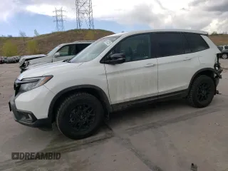 2020 Honda Passport EX-L z VIN 5FNYF8H50LB005186, wystawiony jako Copart lot #54192225 z przebiegiem 60 873 mil mil oraz Szkoda całkowita • Salvage title. Historia ofert i sprzedaży dostępna na DreamBid. Obrazek 1.