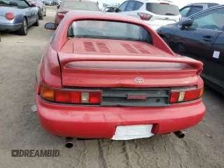 1991 Toyota MR2 z VIN JT2SW21N6M0005280, wystawiony jako Copart lot #76750304 z przebiegiem Nie podano mil oraz Szkody całkowita. Historia ofert i sprzedaży dostępna na DreamBid. Obrazek 6.