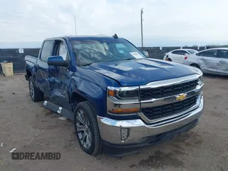 2018 Chevrolet Silverado 1500 LT with VIN 3GCPCREH1JG125997, listed as a IAAI auction lot 41884888 with 122,406 mi miles and . Bid and sale history available at DreamBid. Image 1.