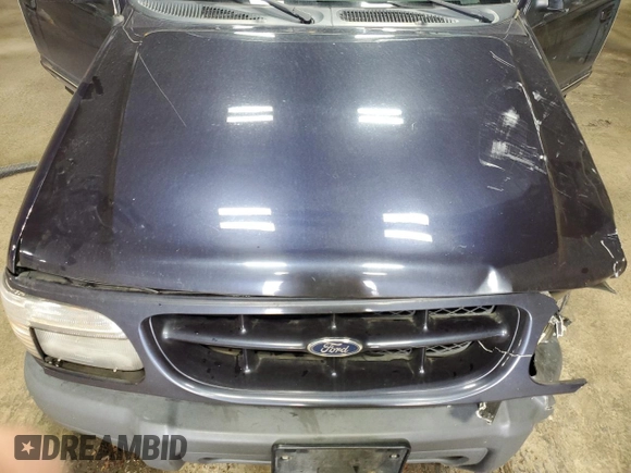 2000 Ford Explorer XLS z VIN 1FMZU72X7YUA71727, wystawiony jako Copart lot #51416935 z przebiegiem 163 005 mil mil oraz Szkoda całkowita • Salvage title. Historia ofert i sprzedaży dostępna na DreamBid. Obrazek 12.