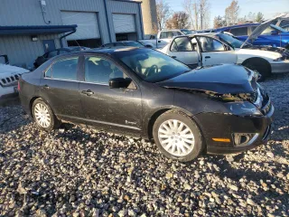 2010 Ford Fusion Hybrid with VIN 3FADP0L38AR379341, listed as a Copart auction lot 77114174 with 274,779 mi miles and Clean Title. Bid and sale history available at DreamBid. Image 4.