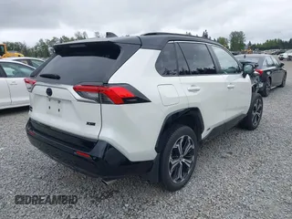 2022 Toyota RAV4 XSE with VIN JTMEB3FV1ND100256, listed as a IAAI auction lot 42127288 with 30,367 mi miles and . Bid and sale history available at DreamBid. Image 4.