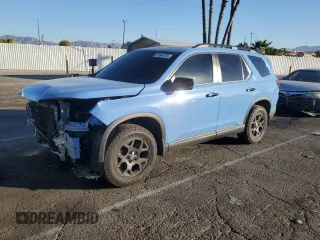 2023 Honda Pilot TrailSport with VIN 5FNYG1H67PB038169, listed as a Copart auction lot 81644104 with 34,099 mi miles and Salvage Title. Bid and sale history available at carsss.com. Image 1.