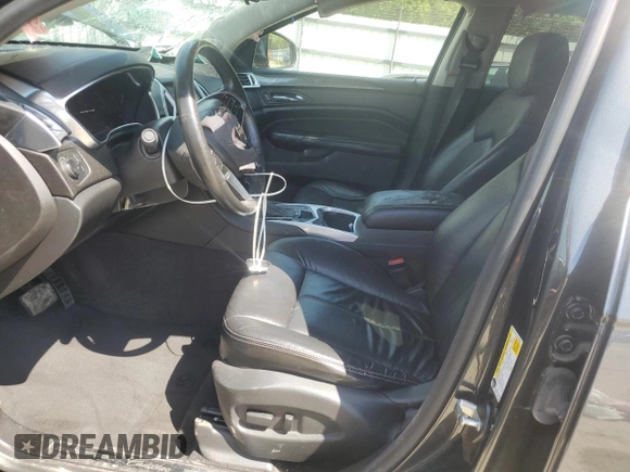 2015 Cadillac SRX z VIN 3GYFNAE31FS571500, wystawiony jako Copart lot #54106885 z przebiegiem 123 114 mil mil oraz Szkoda całkowita • Salvage title. Historia ofert i sprzedaży dostępna na DreamBid. Obrazek 7.