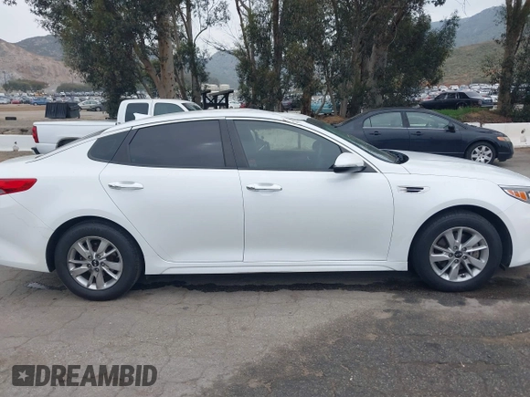 2018 Kia Optima LX with VIN 5XXGT4L3XJG215632, listed as a IAAI auction lot 41785035 with 94,854 mi miles and . Bid and sale history available at DreamBid. Image 13.