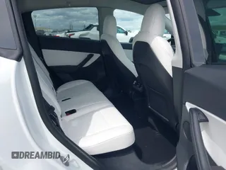 2022 Tesla Model Y Long Range with VIN 7SAYGDEE2NF403354, listed as a IAAI auction lot 41986216 with 53,177 mi miles and . Bid and sale history available at DreamBid. Image 8.