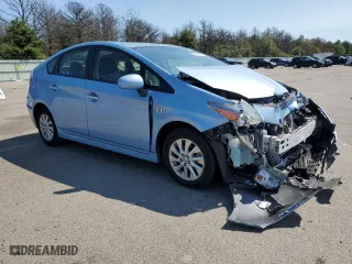 2014 Toyota Prius Plug-In with VIN JTDKN3DP5E3056010, listed as a Copart auction lot 69784694 with 83,018 mi miles and Salvage Title. Bid and sale history available at carsss.com. Image 4.
