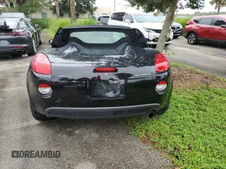 2006 Pontiac Solstice z VIN 1G2MB33B56Y000343, wystawiony jako Copart lot #74567004 z przebiegiem Nie podano mil oraz Szkoda całkowita • Salvage title. Historia ofert i sprzedaży dostępna na DreamBid. Obrazek 6.