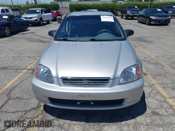 1997 Honda Civic LX z VIN 2HGEJ6670VH570062, wystawiony jako IAAI lot #42218254 z przebiegiem 86 555 mil mil oraz . Historia ofert i sprzedaży dostępna na DreamBid. Obrazek 12.