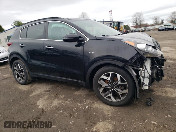 2020 Kia Sportage EX z VIN KNDPNCAC1L7779818, wystawiony jako Copart lot #51934025 z przebiegiem 77 170 mil mil oraz Szkoda całkowita • Salvage title. Historia ofert i sprzedaży dostępna na DreamBid. Obrazek 4.