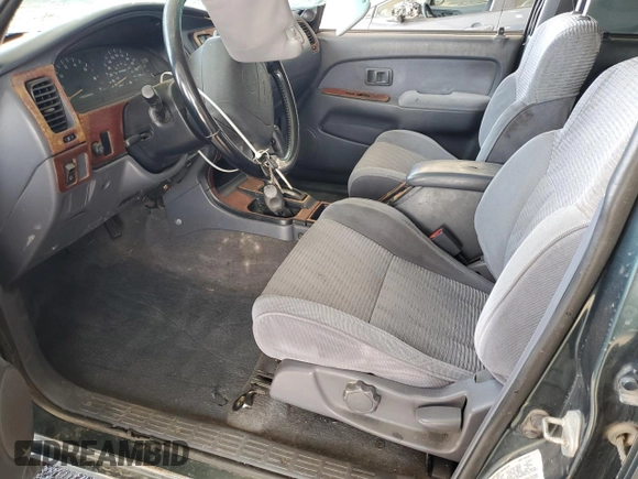1997 Toyota 4Runner SR5 z VIN JT3HN86R4V0109713, wystawiony jako Copart lot #52540845 z przebiegiem 330 787 mil mil oraz Szkoda całkowita • Salvage title. Historia ofert i sprzedaży dostępna na DreamBid. Obrazek 7.