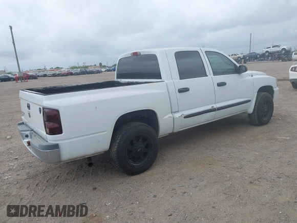 2006 Dodge Dakota SLT with VIN 1D7HE48K56S532946, listed as a IAAI auction lot 41878467 with 106,218 mi miles. Bid and sale history available at carsss.com. Image 4.
