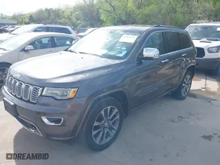 2017 Jeep Grand Cherokee Overland with VIN 1C4RJECG1HC614740, listed as a IAAI auction lot 41912523 with 177,353 mi miles. Bid and sale history available at carsss.com. Image 2.