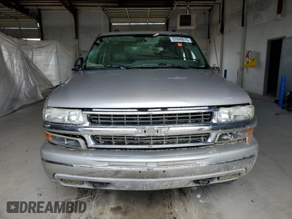 2004 Chevrolet Tahoe LT with VIN 1GNEC13Z14J323770, listed as a Copart auction lot 57846675 with 140,232 mi miles and Salvage title. Bid and sale history available at DreamBid. Image 5.