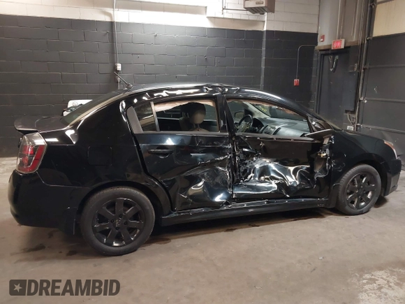 2011 Nissan Sentra SR with VIN 3N1AB6AP8BL647168, listed as a IAAI auction lot 40694237 with 135,622 mi miles and . Bid and sale history available at DreamBid. Image 6.