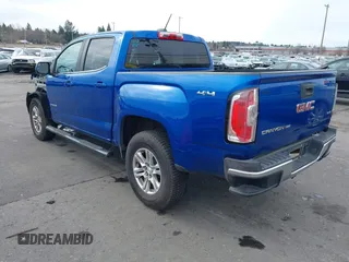 2019 GMC Canyon 4WD SLE with VIN 1GTG6CEN6K1304918, listed as a IAAI auction lot 41624468 with 102,579 mi miles. Bid and sale history available at carsss.com. Image 3.