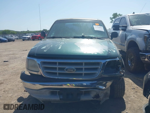 1999 Ford F-150 XL z VIN 2FTRX18L9XCA01139, wystawiony jako IAAI lot #42550053 z przebiegiem 263 950 mil mil oraz . Historia ofert i sprzedaży dostępna na DreamBid. Obrazek 12.