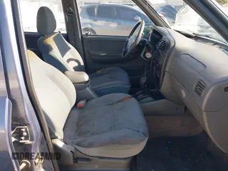 2001 Kia Sportage with VIN KNDJB723015065059, listed as a IAAI auction lot 41554856 with 170,827 mi miles. Bid and sale history available at carsss.com. Image 5.