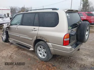 2003 Suzuki XL7 Touring with VIN JS3TX92V334115616, listed as a IAAI auction lot 40899791 with 154,521 mi miles and . Bid and sale history available at DreamBid. Image 3.