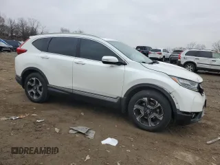 2018 Honda CR-V Touring with VIN 2HKRW2H98JH695059, listed as a Copart auction lot 86452054 with 114,437 mi miles and Salvage Title. Bid and sale history available at DreamBid. Image 4.