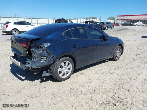 2014 Mazda Mazda3 i Sport with VIN JM1BM1U74E1195564, listed as a IAAI auction lot 41810886 with 108,995 mi miles. Bid and sale history available at carsss.com. Image 4.