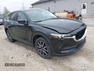 2018 Mazda CX-5 Grand Touring with VIN JM3KFBDM3J0384431, listed as a IAAI auction lot 42013474 with 65,018 mi miles. Bid and sale history available at carsss.com. Image 1.
