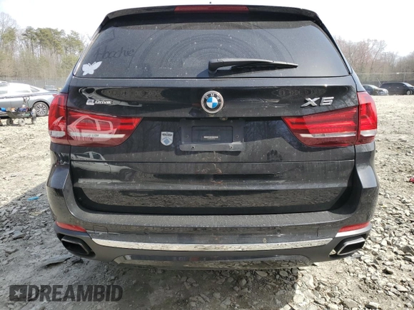 2016 BMW X5 xDrive40e z VIN 5UXKT0C59G0S77407, wystawiony jako Copart lot #50094255 z przebiegiem 93 264 mil mil oraz Szkoda całkowita • Salvage title. Historia ofert i sprzedaży dostępna na DreamBid. Obrazek 6.