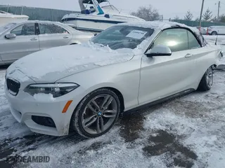 2018 BMW 2 Series 230i xDrive with VIN WBA2K1C52JVB64595, listed as a IAAI auction lot 41604748 with 47,461 mi miles. Bid and sale history available at carsss.com. Image 2.