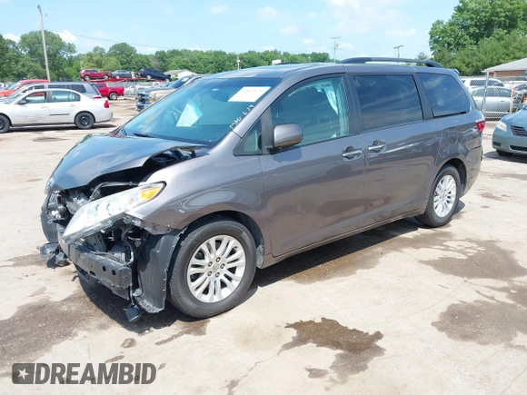 2015 Toyota Sienna XLE with VIN 5TDYK3DCXFS633128, listed as a IAAI auction lot 42527073 with 149,926 mi miles and . Bid and sale history available at DreamBid. Image 18.