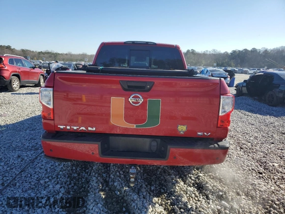 2021 Nissan Titan SV z VIN 1N6AA1EF2MN518203, wystawiony jako Copart lot #86769034 z przebiegiem 129 900 mil mil oraz Szkoda całkowita • Salvage title. Historia ofert i sprzedaży dostępna na DreamBid. Obrazek 6.