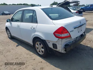 2010 Nissan Versa S with VIN 3N1BC1AP1AL420360, listed as a IAAI auction lot 42404492 with 121,897 mi miles and . Bid and sale history available at DreamBid. Image 3.