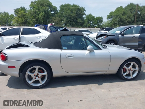 2002 Mazda MX-5 Miata Cloth z VIN JM1NB353020225252, wystawiony jako IAAI lot #42303820 z przebiegiem 194 549 mil mil oraz . Historia ofert i sprzedaży dostępna na DreamBid. Obrazek 13.