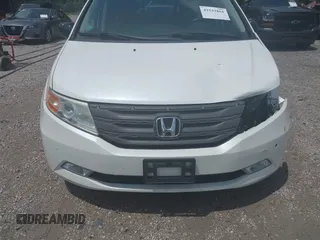 2013 Honda Odyssey Touring with VIN 5FNRL5H9XDB049390, listed as a IAAI auction lot 42532861 with 129,376 mi miles and . Bid and sale history available at DreamBid. Image 18.