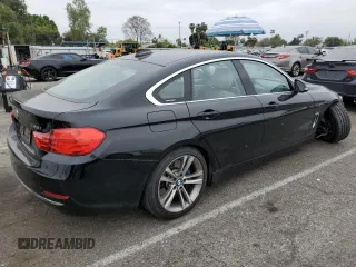 2015 BMW 4 Series 428i with VIN WBA4A5C59FGK15506, listed as a Copart auction lot 54249435 with 27,883 mi miles and Salvage title. Bid and sale history available at DreamBid. Image 3.