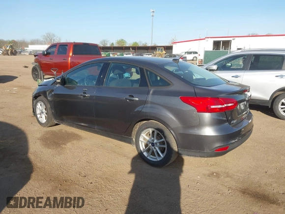 2016 Ford Focus SE with VIN 1FADP3F2XGL207906, listed as a IAAI auction lot 42099203 with 95,527 mi miles. Bid and sale history available at carsss.com. Image 3.