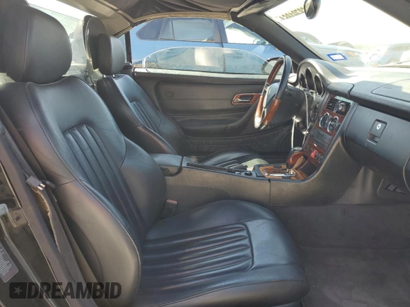 2004 Mercedes-Benz SLK-Class with VIN WDBKK65F24F306069, listed as a Copart auction lot 68791864 with 99,835 mi miles and Salvage Title. Bid and sale history available at carsss.com. Image 10.