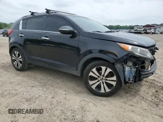 2011 Kia Sportage EX with VIN KNDPC3A2XB7108904, listed as a Copart auction lot 54012865 with 241,315 mi miles and Salvage title. Bid and sale history available at DreamBid. Image 4.