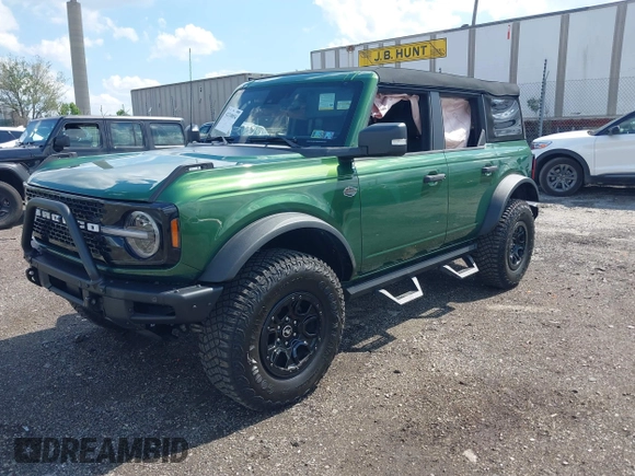 2023 Ford Bronco with VIN 1FMEE5DP0PLB80676, listed as a IAAI auction lot 42210054 with 6,796 mi miles and . Bid and sale history available at DreamBid. Image 16.