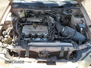 1998 Ford Escort SE with VIN 1FAFP13P7WW266180, listed as a Copart auction lot 61625005 with 143,982 mi miles and Salvage title. Bid and sale history available at DreamBid. Image 13.
